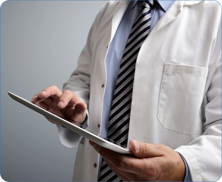 A doctor is using his tablet computer.